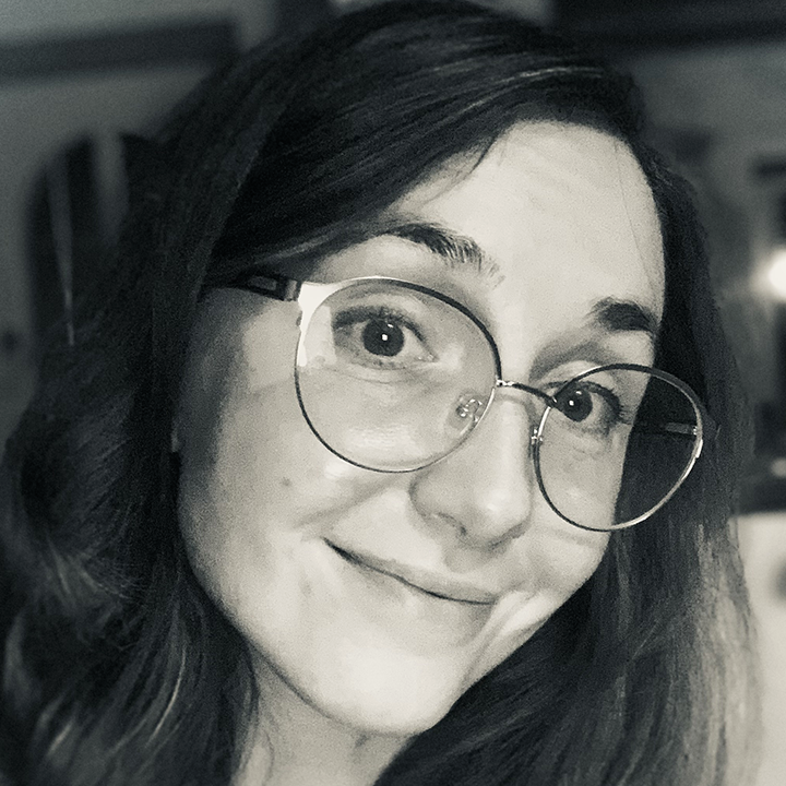 Barber 1 young man with beard smiling and wearing a  brown shirt